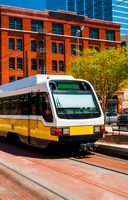 DART light rail train at a station in downtown Dallas.